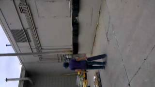 Kickflip off big dock in front of taco bell
