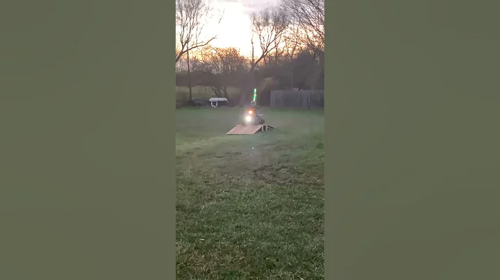 2 year old Christopher going over a ramp on his qu...