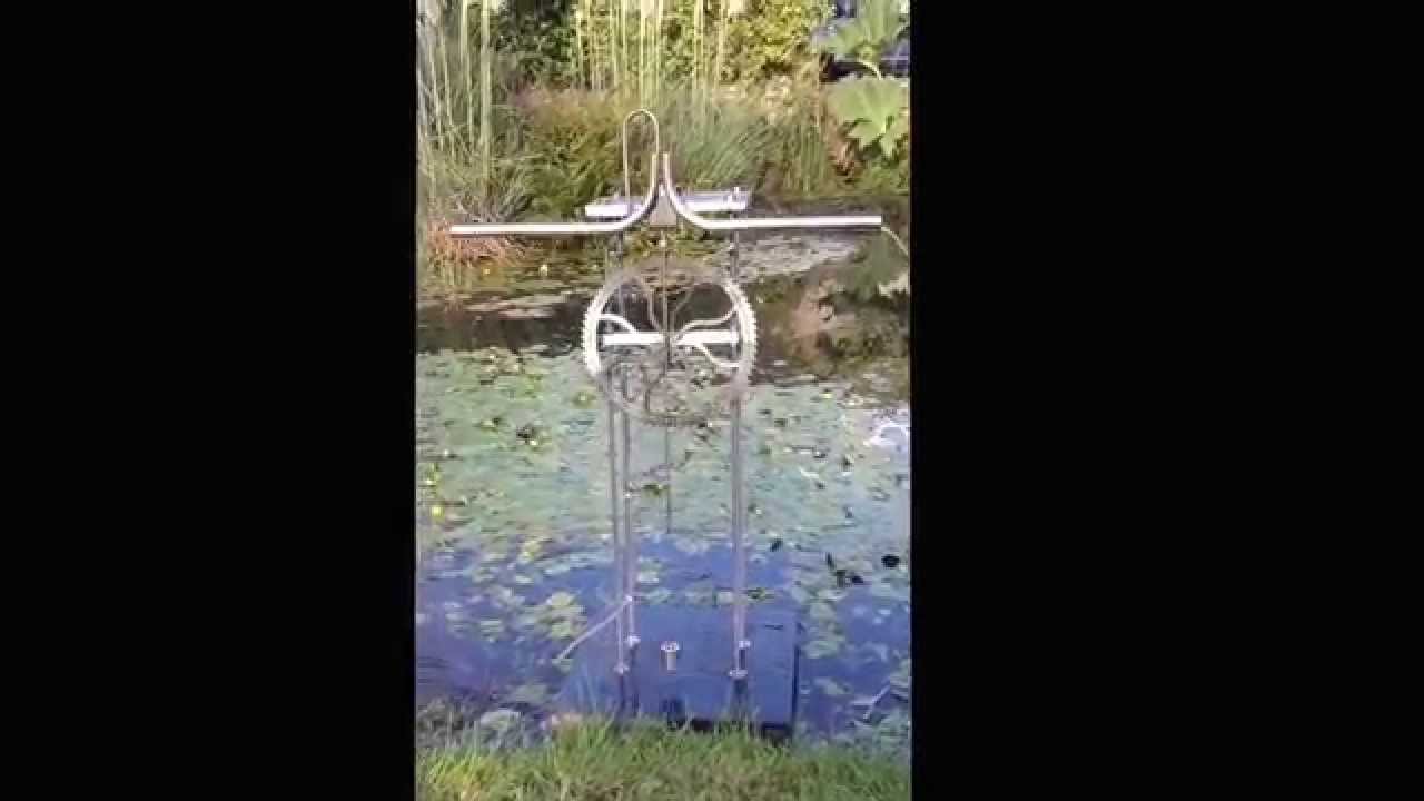 This water powered kinetic sculpture stands 1 meter tall and the wheel ...