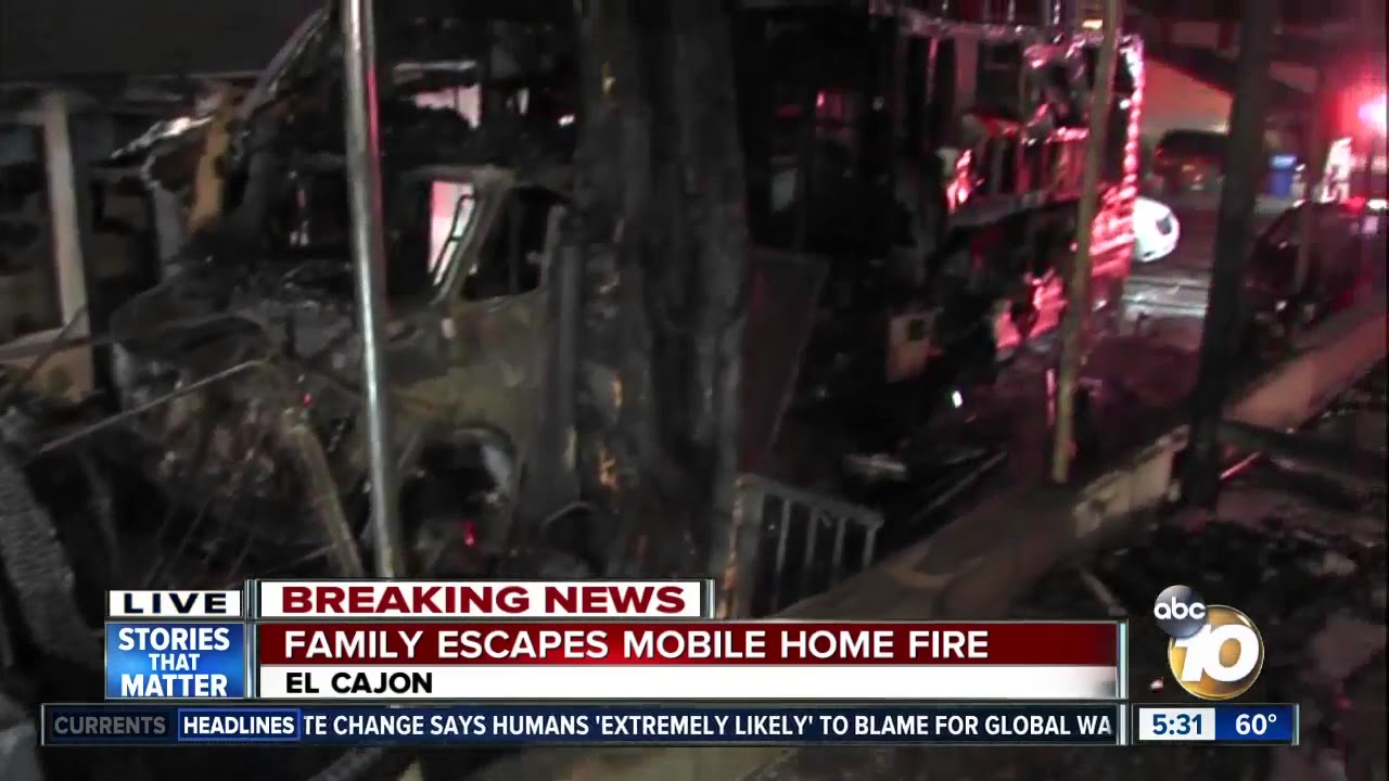 Family escapes mobile home fire - YouTube