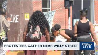 Protesters gather near site of deadly shooting