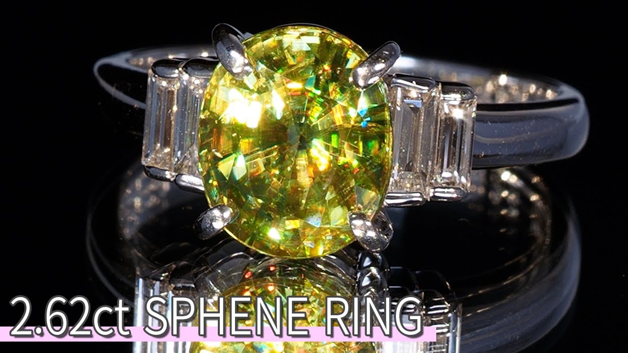 大粒の強い煌めき 2.62ct スフェーンリング（0.235ct バケット 