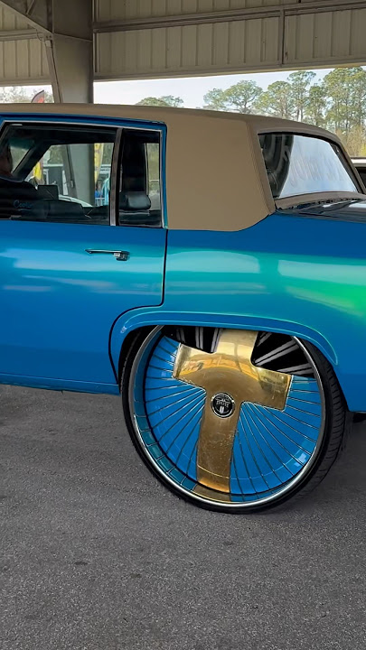 Cadillac on 30” DUB Floaters at the Carshow