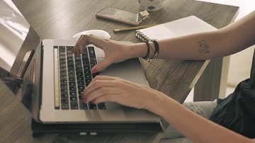 Hands of a girl working on a computer  Free Stock Video