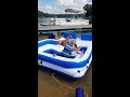 Women Struggle to Get out of Inflatable Raft - 995017