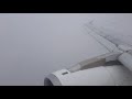 Passenger view 5f aegean airlines a3860 a320 rainy approach and landing at vienna airport vie