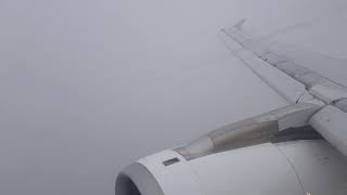 Passenger view 5F Aegean Airlines A3860 A320 Rainy Approach and Landing at Vienna airport (VIE)