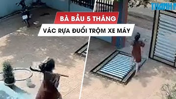 Bà bầu 5 tháng vác rựa 