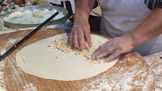 istanbul street food | peynirli gözleme - turkish white cheese with flatbread | turkey street food