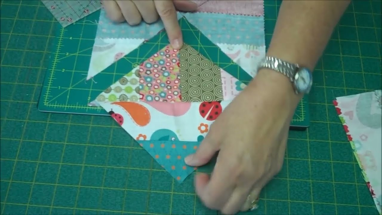 Close-up of 3 Dudes quilt blocks arranged