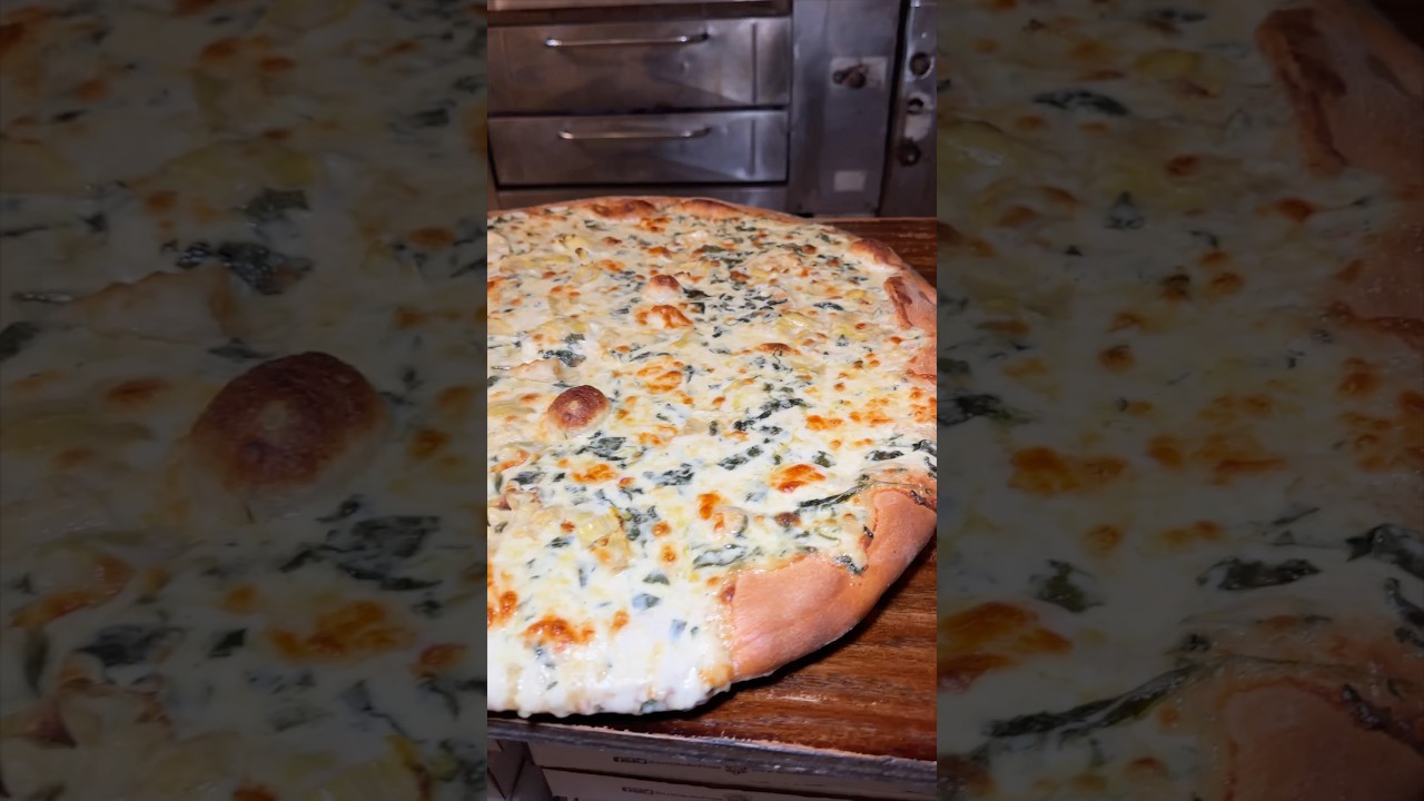 The one and only ARTICHOKE PIZZA from Artichoke Basille’s Pizza in NYC! 🍕💦 A staple! #DEVOURPOWER