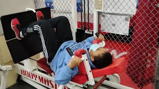 Lay down machine squats