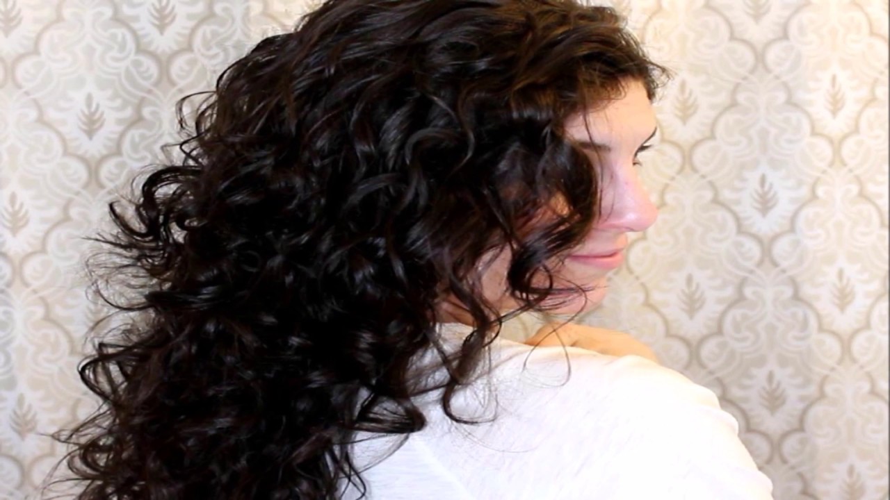 Esta mujer pone una camiseta alrededor de su pelo mojado. ¿Que pasa cuando la retira? camera iphone 8 plus apk