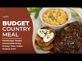 Budget country meal hamburger steaks homemade gravy cheesy tater cakes  creamy corn 1146