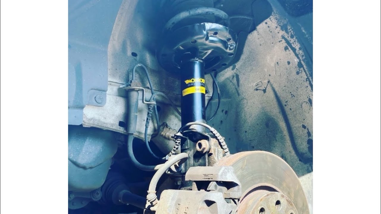 HOW TO REPLACE CAR STRUT HOW TO REPLACE VAUXHALL CORSA STRUT