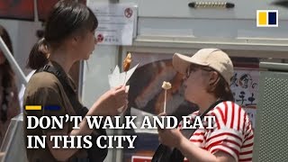 Japanese city of Kamakura warns tourists not to eat and walk at the same time