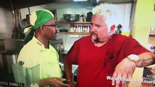Guy Fieri eats a pineapple to cool down his mouth.