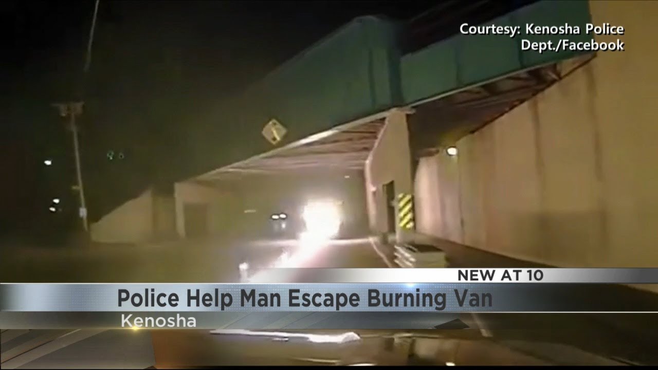 Caught on camera: Kenosha police save elderly man from burning vehicle ...