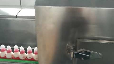 automatic sleeve applicator+steam shrink tunnel for milk bottle. howfond@126.com