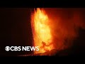 Hawaii's Kīlauea volcano erupts again, spews lava from crater | CBS News