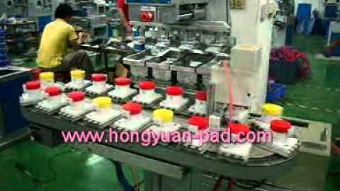 Four color pad printing machine with flame treatment system