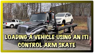 LOADING A VEHICLE USING AN ITI CONTROL ARM SKATE