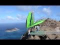 Dave goto launches his hang glider at makapuu oahu