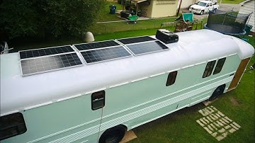 School Bus Conversion Episode 17 - Starting the solar power installation, water tank, and plumbing