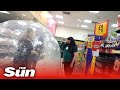 Britain woman shops in zorb ball after Corona scare, goes viral