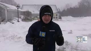Heavy snow collects on sidewalks, roadways on the East End