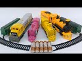ASMR unboxing dan merakit mainan kereta api classic train kuning,kereta api diesel konstruksi