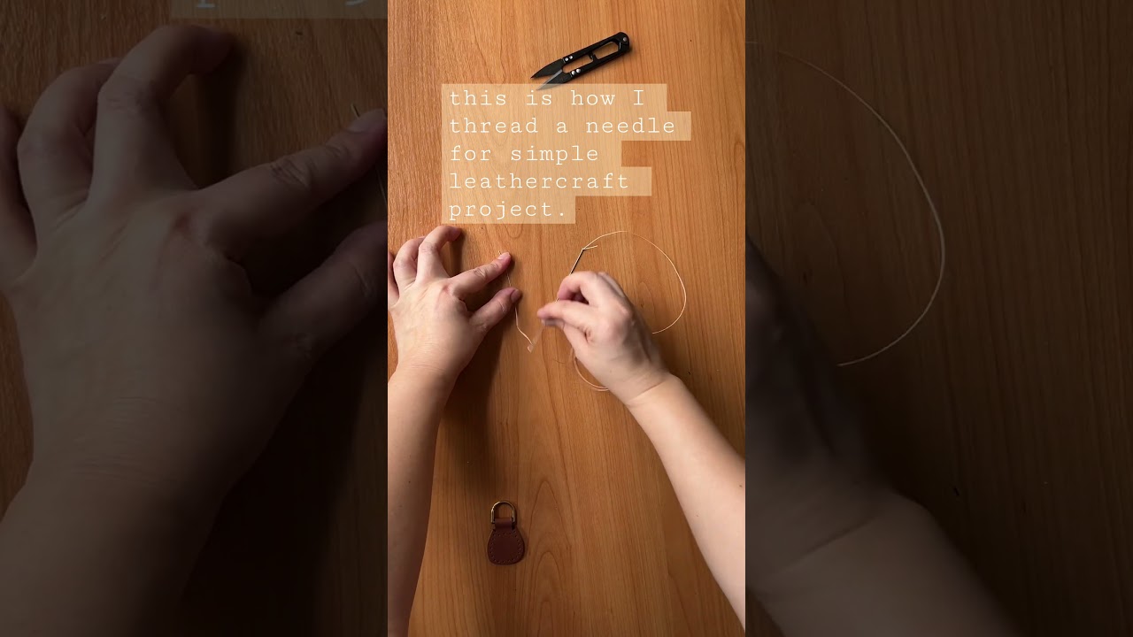 Threading a needle for saddle stitching leather. 