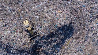#excavator | Aerial view of a large landfill. Garbage disposal, environmental pollution