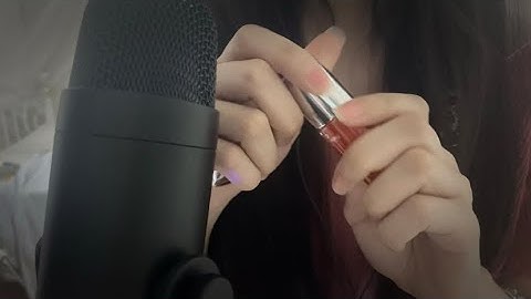 My first ASMR video (random triggers, lipgloss, whispering, mouth sounds, tapping etc.)