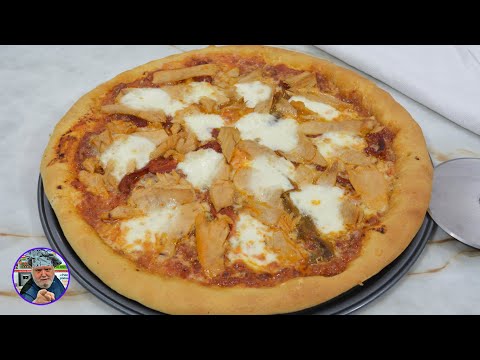 Pizza de atún con mozzarella y pimientos con receta casera de la masa para pizza