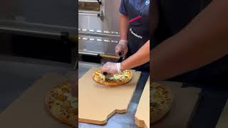 Domino’s pizza making#youtubeshorts #foodreview #yshorts #trendingshorts #trending #dubaidominos#yum screenshot 2