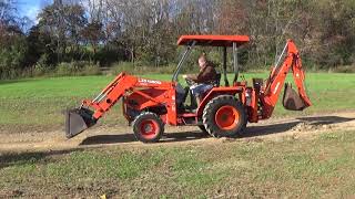 2002 Kubota L35 4X4 Tractor With Loader, Backhoe, And Canopy