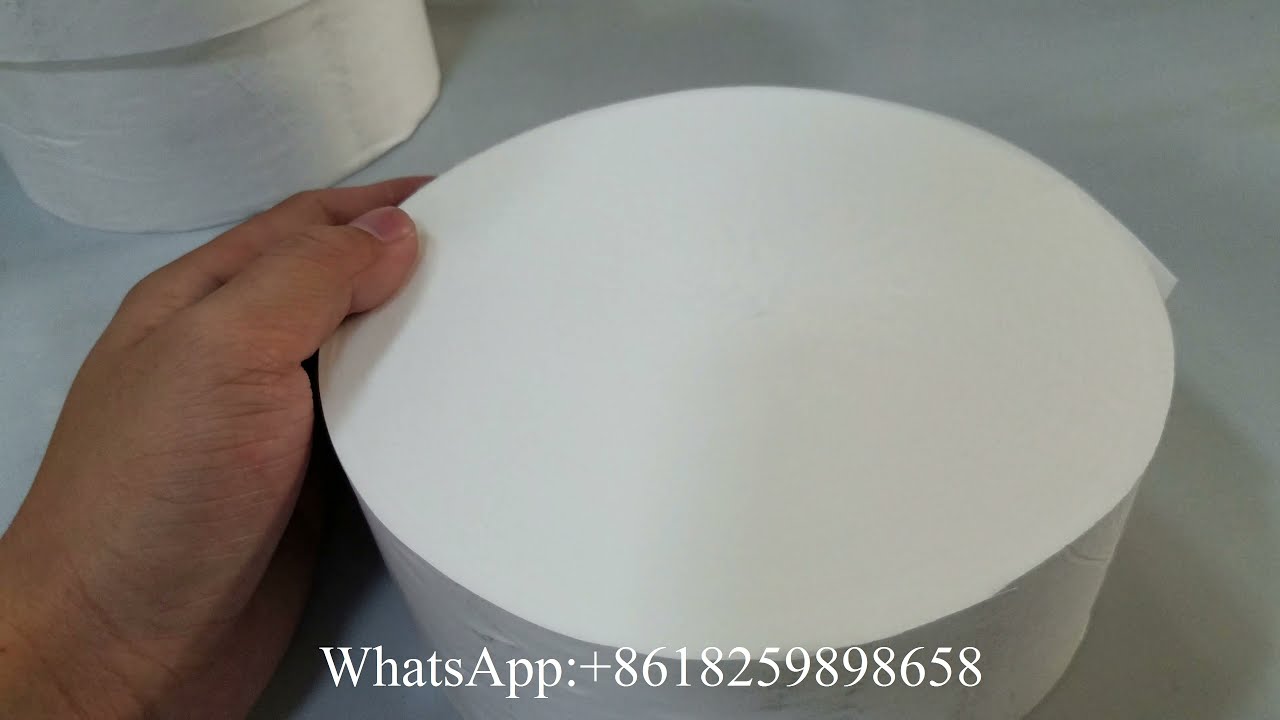 Automatic absorbent cotton roll band saw cutting machine