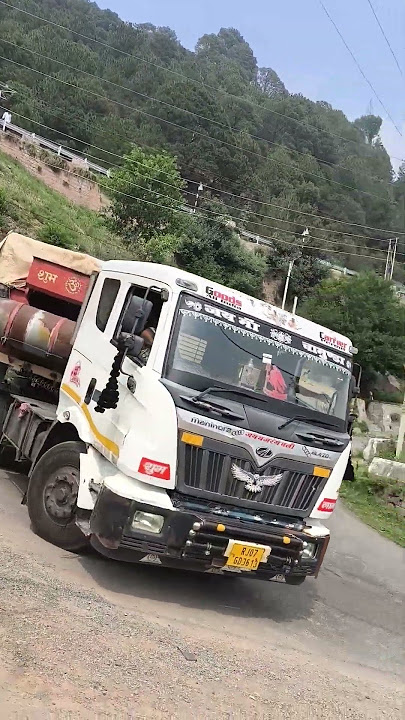 Long Truck Snakes Down the Sharp Curve 🚛⤵️