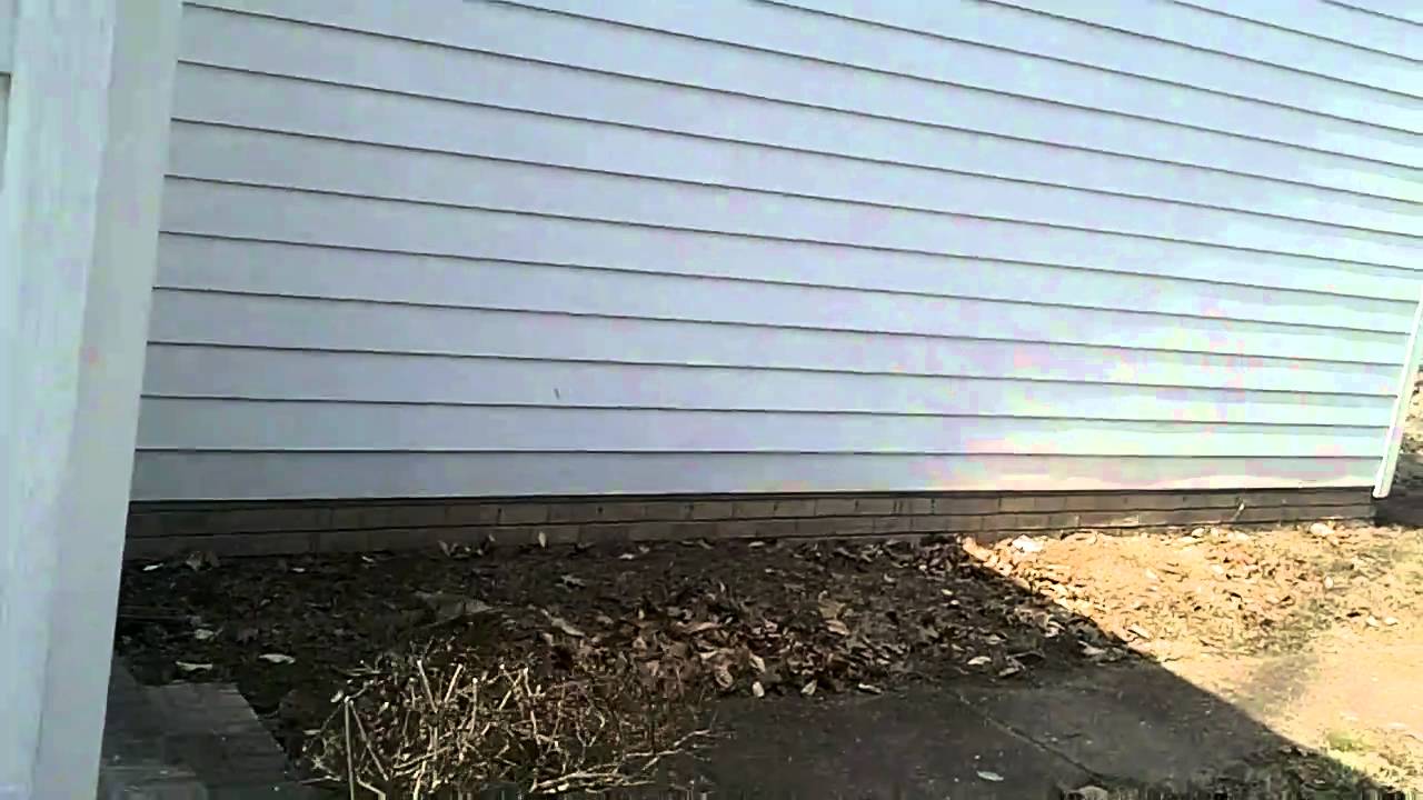 Water damaged Masonite siding found by Franklin TN A+ Home Inspections