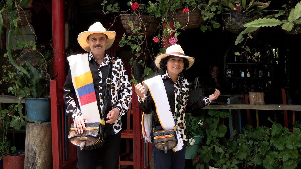 LA FERIA DE LAS FLORES NICOLAS MUÑOZ Y MIGUEL ANGEL MUÑOZ.