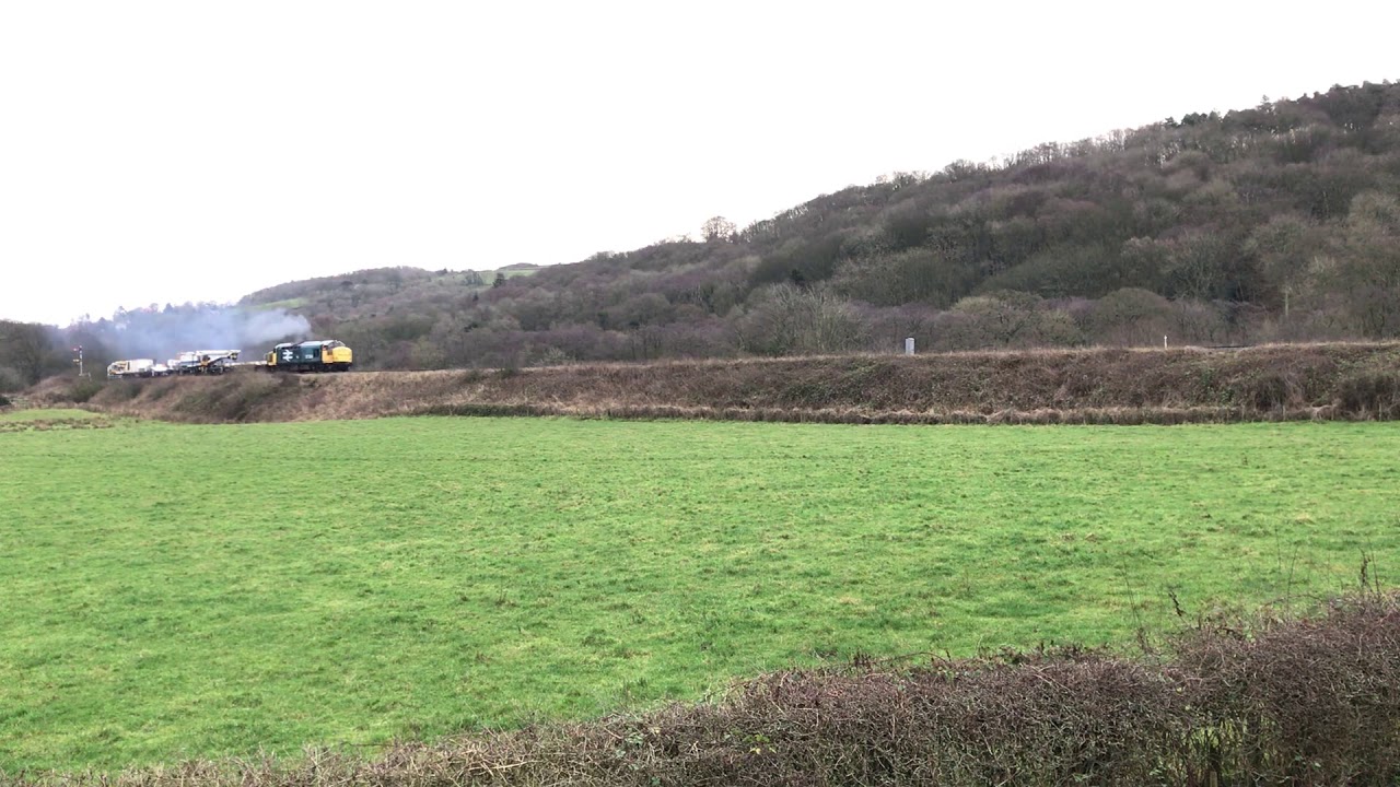 Class 37 with Volker Rail cranes passing Esk Valley NYMR 3/1/20