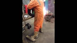 Testing flame retardant overalls
