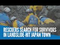 Rescuers search for survivors in landslide-hit Japan town