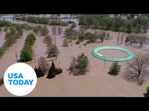 Aerial drone shows massive flooding in Michigan | USA TODAY