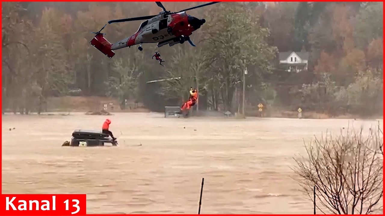 US Coast Guard rescues five people stranded by floods in Washington ...