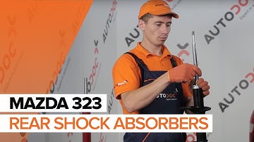 How to change rear shock absorbers on MAZDA 323 F TUTORIAL | AUTODOC