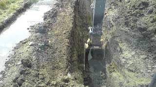 One way to control the water when you are digging