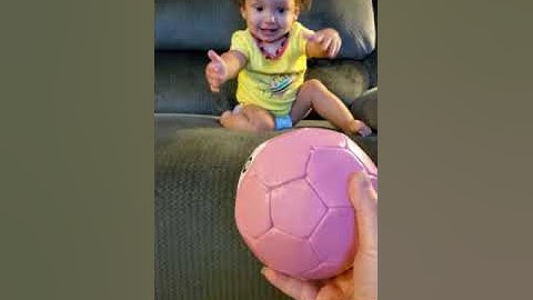 Valencia rolls new soccer ball with Mommy @ 15-months-old