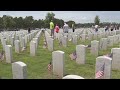 Jacksonville National Cemetery encourages volunteers to help place flags on graves Thursday